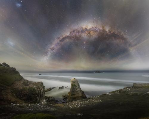 amazinglybeautifulphotography:Milky Way arch over Muriwai Beach, New Zealand [2160 x 1728][OC] -@kchayphotos - Author: chaka160 on Reddit