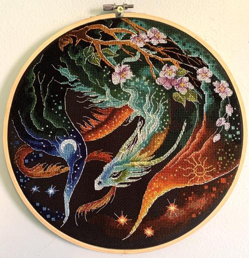 crossstitchworld:Finished this dragon today! One of my favorite patterns I’ve ever stitched. bybikes