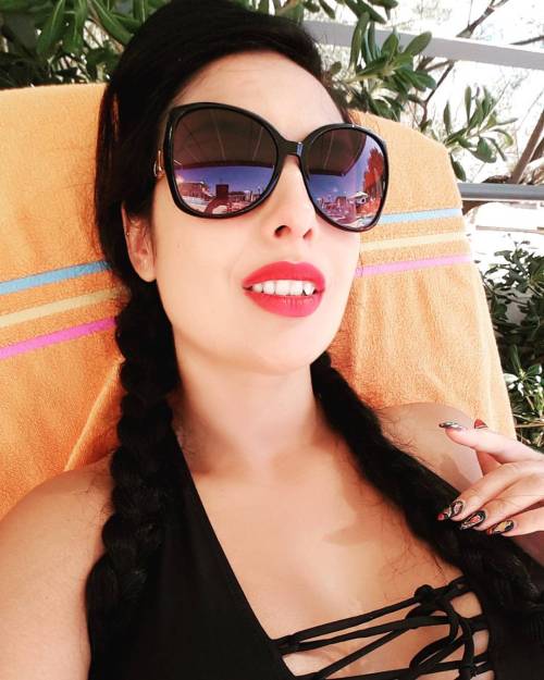 By the pool, amused by the way My boys performed the tasks for My pleasure.#GoddessWorship #slaveass