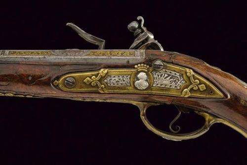 Ornate flintlock pistol crafted by Diego Zanoni of Brescia, Italy, mid 18th century.from Czerny’s In