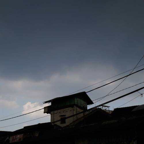 Porn Pics Silhouette of a house against the cloudy