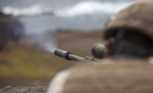 militaryarmament:  U.S. Marine Scout Snipers assigned to Sniper Platoon, Second Battalion, Third Marines (2/3), fire down range at Range 10 aboard Marine Corps Base Hawaii (MCBH), Apr. 8th, 2015. 