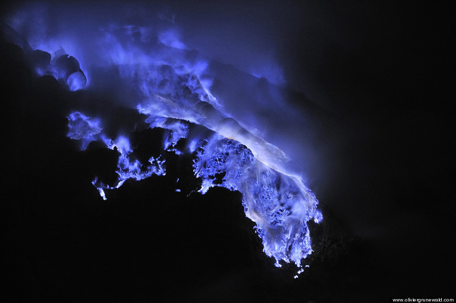 sixpenceee:Neon blue lava pours from Indonesia’s Kawah Ijen Volcano. The reason