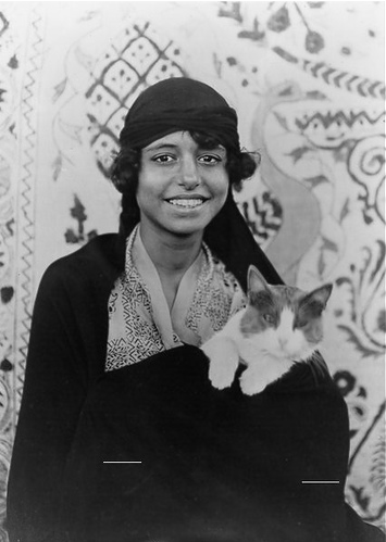 bastet-rising:   Egyptian woman and her cat, 1923.