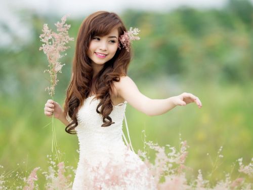 Beautiful Girl With Flowers In Hair Girl In Nature Beautiful Girl Smiling Flowers In The Hair And Gi