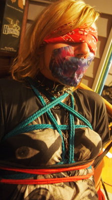 gagged4life:  kinkyroom:  Time Out Chair 18 by NorthernKnots  Wonderful juxtaposition here with the bandanna blindfold and the tie-dye duct tape, not to mention the different rope colors. It’s easy for such a hodgepodge to look sloppy, but NorthernKnots