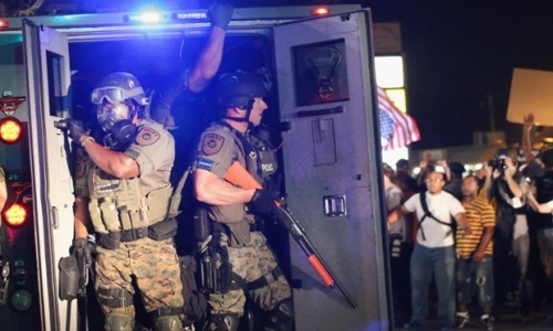 ephitania:
“guardian:
“ Ferguson: Police arrested 31 as they clashed with protesters in another night of gunfire, teargas and chaos in Ferguson 10 days after the shooting of an unarmed teenager ignited an uproar over race in America.
• Read the...