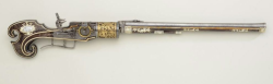 peashooter85:  An ornate 6 shot wheel-lock revolving musket decorated with gold, silver, ivory, and bone.  Originates from Russia, 16th century, possibly restored or added onto in the 18th or 19th century. 