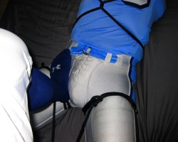 bondagejock:  Spread eagle tied in football gear.4 of 9Sub: Bondagejock  Dom: TheUAJock