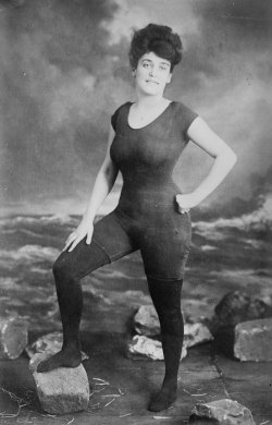 sixpenceee:  Annette Kellerman promotes women’s right to wear a fitted one piece bathing suit. She was arrested for indecency in 1907. 