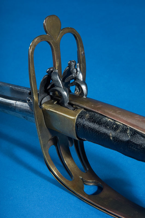 A French flintlock double barrel cutlass pistol dated 1796.