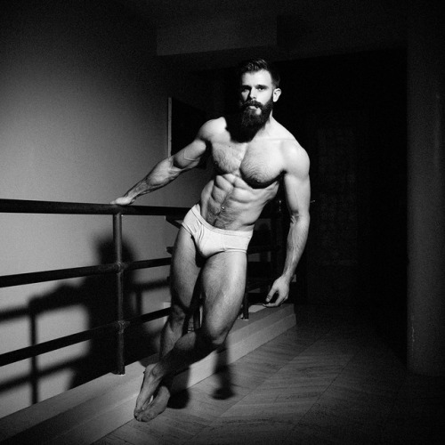 Killian Belliard is the muscled bearded man by definition