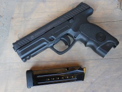 gunrunnerhell:  Steyr L9-A1 The “longslide” version of the Steyr M9-A1. Chambered in 9x19mm, it has a blocky but futuristic look to it. One feature which some people aren’t used to are the trapezoidal sights. It might take a little time to get used