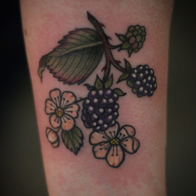 Elegant Botanical Blackwork Tattoo
