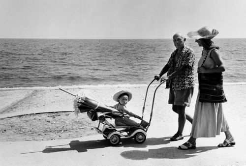 Pablo Picasso, Claude & Françoise Gillot on the beach in Provence by Robert Capa, 1948