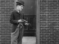 Charlie Chaplin in A Film Johnnie (1914).