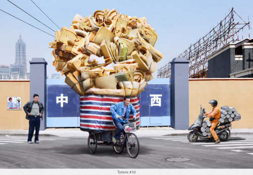 Impressive bike stacking skills of bike couriers in Shanghai captured in photographs by Alain Delorm