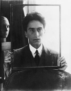 wehadfacesthen:Photo of Jean Cocteau by Man Ray, 1922