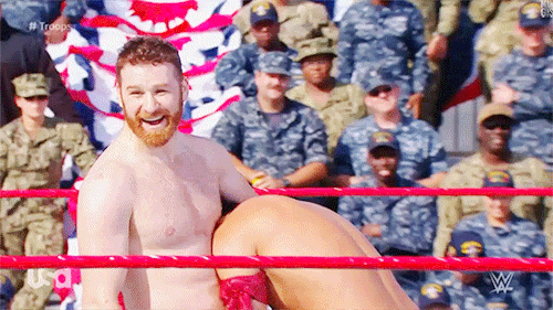 mith-gifs-wrestling:  Sami beams at the audience while beating up Shinsuke Nakamura at Tribute to the Troops.