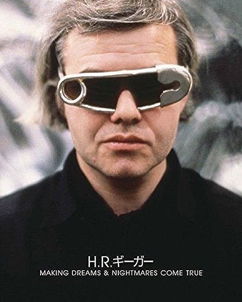 omercifulheaves:H.R. Giger and his custom made giant safety pin sunglasses. That is all.