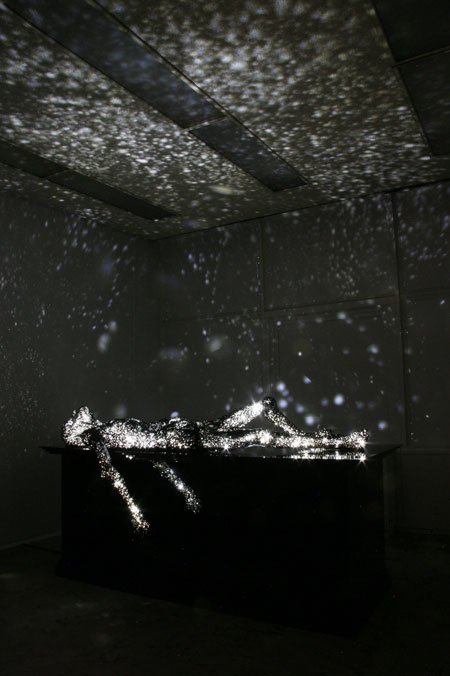 laughingsquid:  Milky Way, Sculptures of Dying Figures That Double as Star Projectors