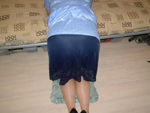 raincoatlover: Now touch mommies slip and tell her how it feels then she may let me wear her slips