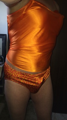 satinslutboy:  Really like this orange satin. Mmmmm 