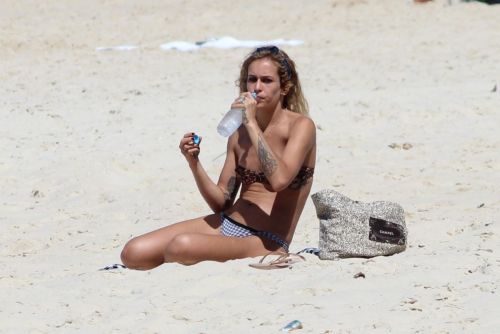 toplessbeachcelebs:  Alice Dellal (Brazilian Model) having difficulty keeping her nipples in her bikini in Rio de Janeiro (October 2013)