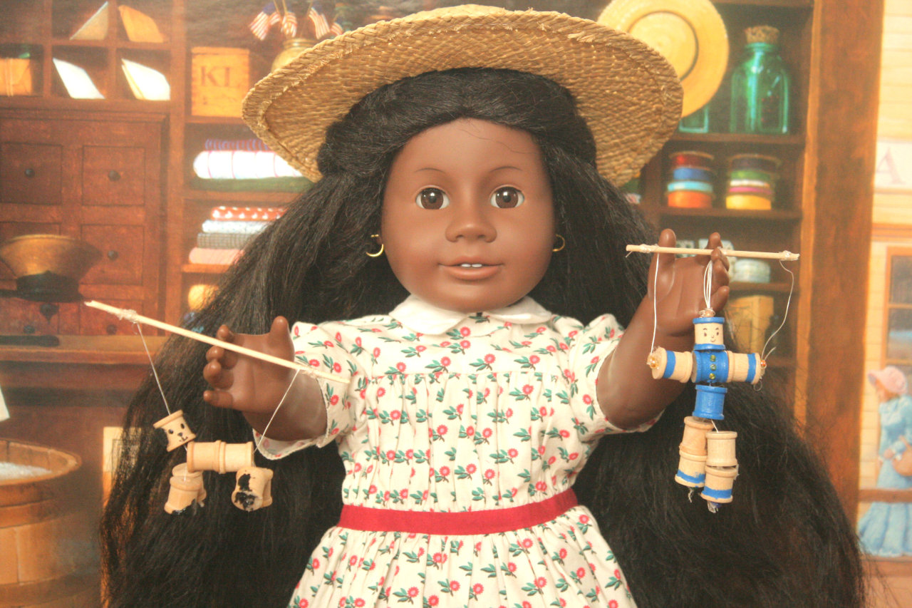 wooden spool doll