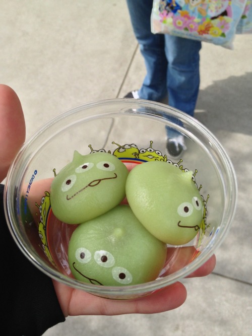 onebigmeshi:Alien head dumplings at Tokyo Disney Sea. They are mochi filled with ice cream. Each one