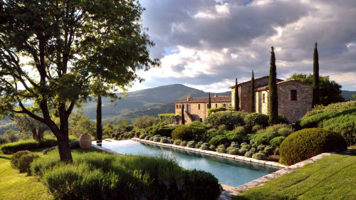 shutcherface:  gatsbyinspired:  vmagazine:  Stretching over thousands of acres of olive groves and forests in the Umbrian hills; Castello Di Reschio Luxury Villas in Umbria, Italy has been restored from secluded ancient farmhouses to contemporary guest