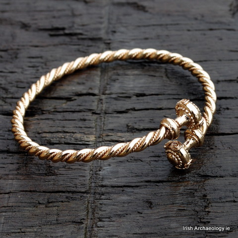Fashioned out of bronze, this distinctive bracelet is inspired by prehistoric gold torcs. Gold torcs