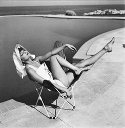 gregorypecks-deactivated2014032:  Audrey Hepburn sunbathing, by Charles Dambier. 