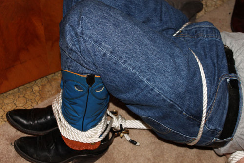 redneckbootfucker: rochboot: Later, the cowboy captured me and got me roped up inside by his boot co