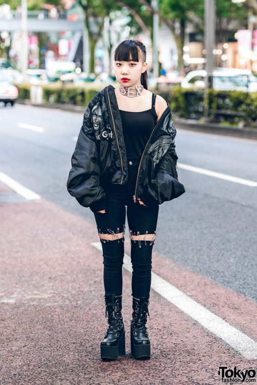 17-year-old Japanese high school student Beni on the street in Harajuku wearing a black bomber jacke