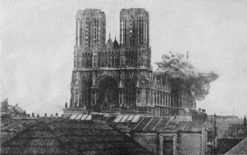 historylover1230:A German shell strikes the 13th Century cathedral of Notre Dame de Reims, September