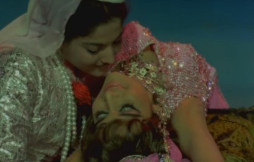 aphroditeinfurs:1. Parveen Babi lulls Hema Malini to sleep in Razia Sultan (1983)2. Asha Parekh