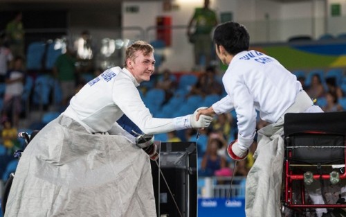 modernfencing: [ID: two wheelchair epee fencers shaking hands after a bout.] Piers Gilliver (left) a