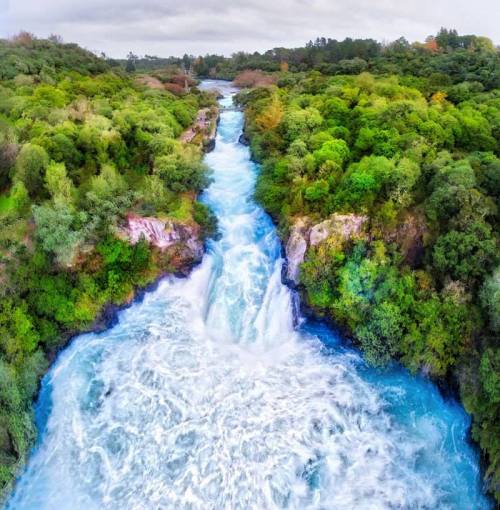 This is a photo of Huka Falls, located outside the small town of Taupo, New Zealand. The falls are l