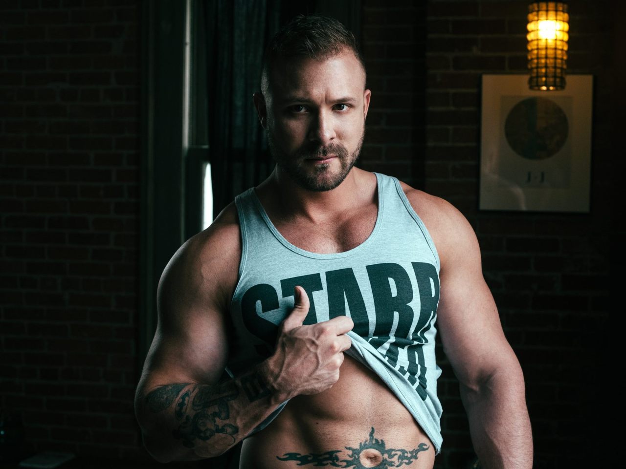 homosexualdelights:  Austin Wolf wearing the Starrfucker Magazine Tank | Photography
