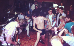mainthreat:  Black Flag - 1984 / 1985 ginn / kira / rollins with chuck dukowski leaning against the peavey PA cab. 