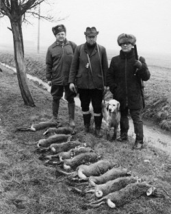 Erich Honecker poses with kills from the