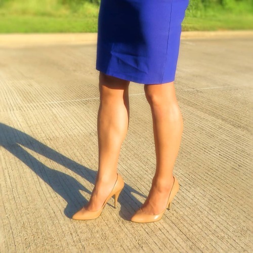 Wearing a blue dress, suntan hold-up stockings, and camel colored pumps.-Dress: @lulus Hosiery: @han
