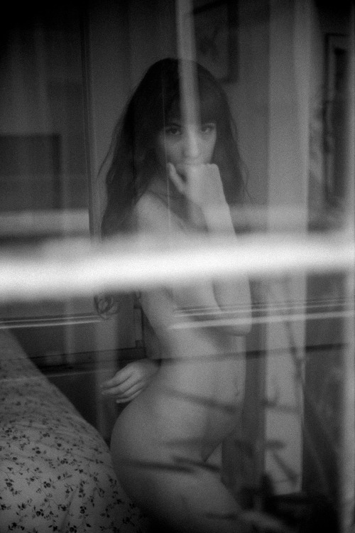 mrchill:Lea, through the moody window · Canon AE1 & Agfa APX400 © Chill · IG & Tumblr for censored stuff· My portfolio for uncensored stuff