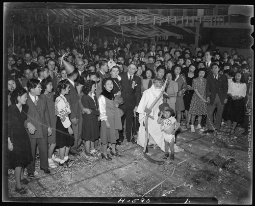 Japanese-American internees mark New Year’s Eve, 12/31/1944, at the Central Utah Internment Camp in 