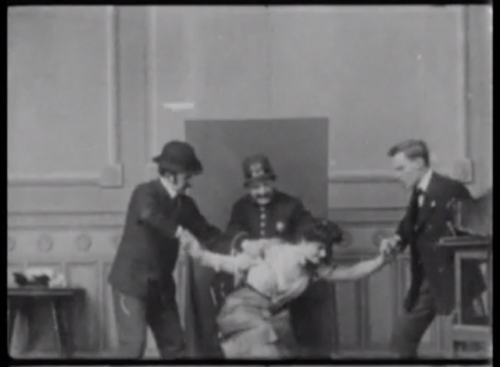 Photographing a Female Crook, dir. Wallace McCutcheon, prod. American Mutoscope and Biograph Co., 19