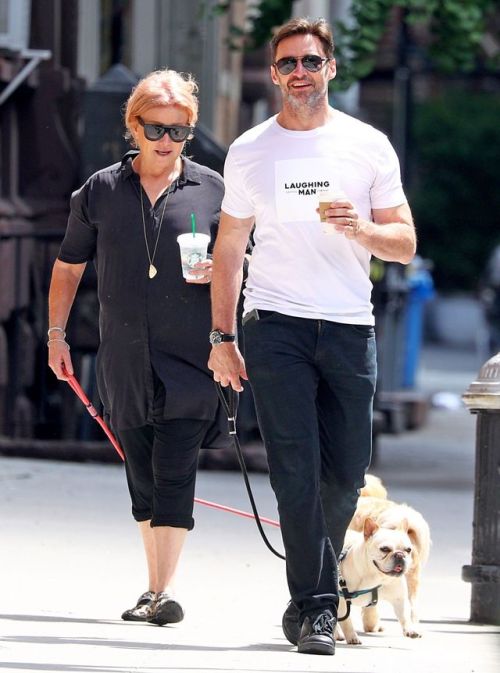 Hugh Jackman Wearing a ‘Laughing Man’ Coffee shop t-shirt out with his wife walking their Dogs Dali 