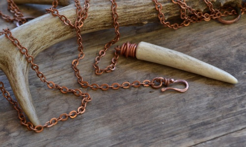 Ethically collected antlers with recycled copper handmade clasps. Lariat and front clasp neckla