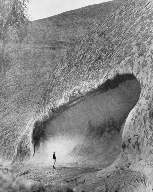 equatorjournal: Ayers Rock, Northern territory, 1957. Photo by K. W. Jacoby. “One of the caves