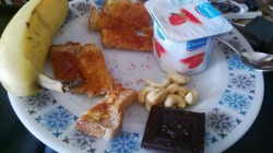 curvesblrdomains:  Breakfast: cashews, 81% dark chocolate, fat free yogurt, banana, wholemeal toast with low fat butter and no added sugar jam … (: 